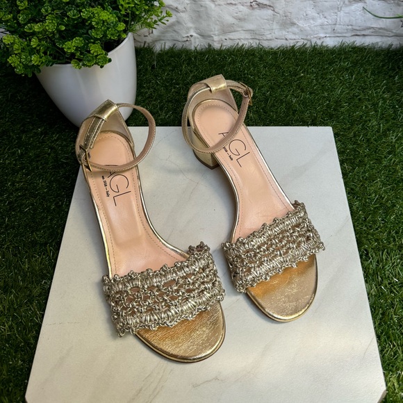 AGL
Crochet Penny Block Heel Sandal in Golden Platino color size 36.5 US 6.5 - Picture 13 of 14